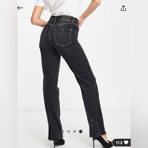River Island 90s high rise straight cut jeans with slit hem in black.
